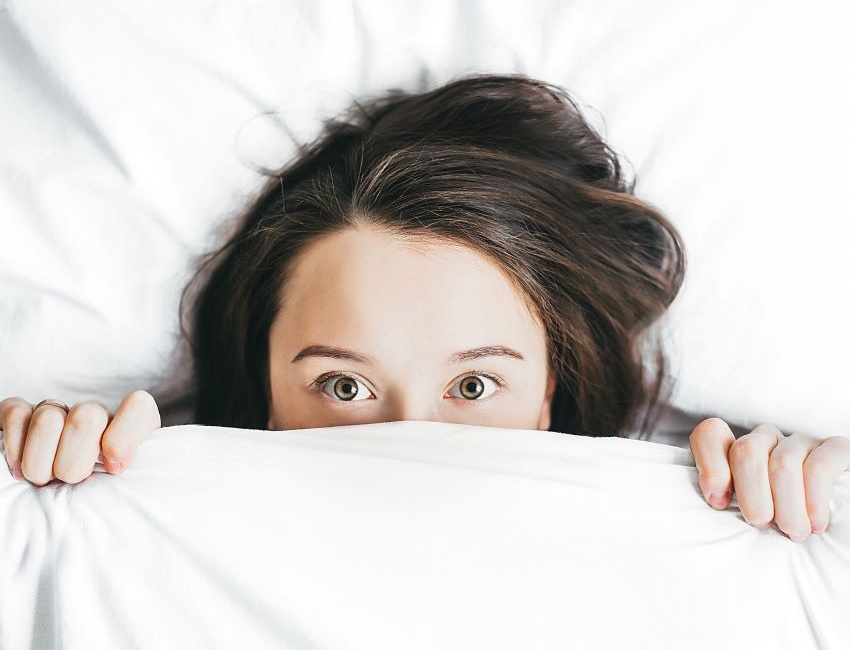 Woman reluctant to get out of bed