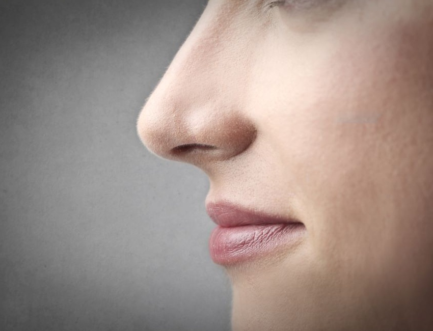 Woman breathing through her nose rather than mouth