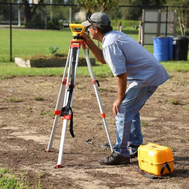 morgan-land-surveyor-in-field
