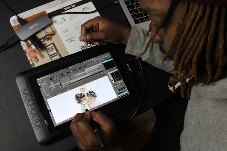 Student animating on tablet device