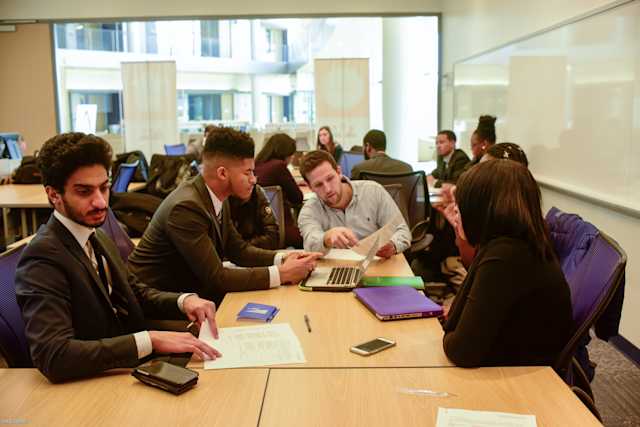 Students working in a collaborative classroom setting