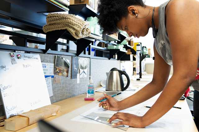 student working on architectural drafting