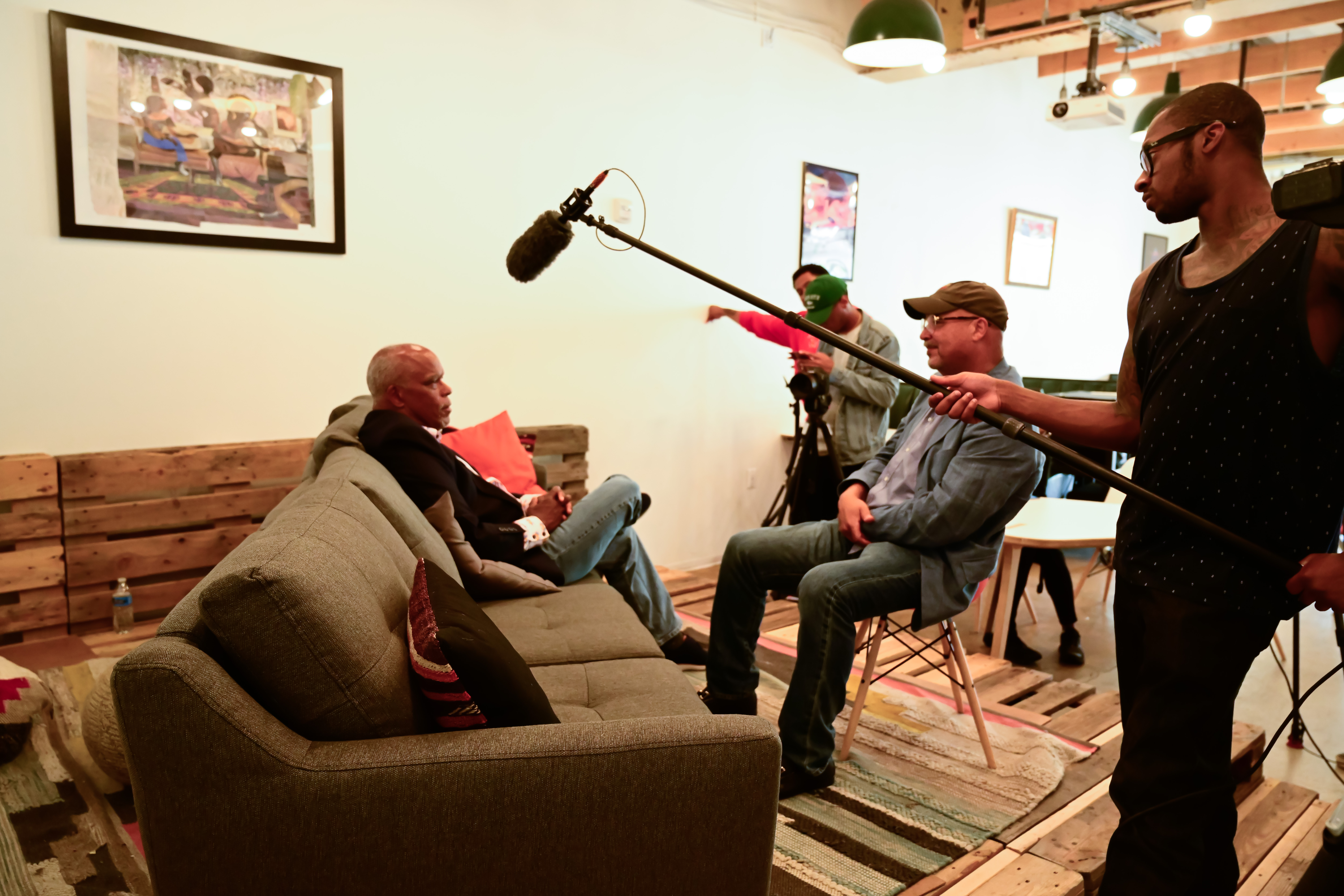 students conducting interview on a professional filming set
