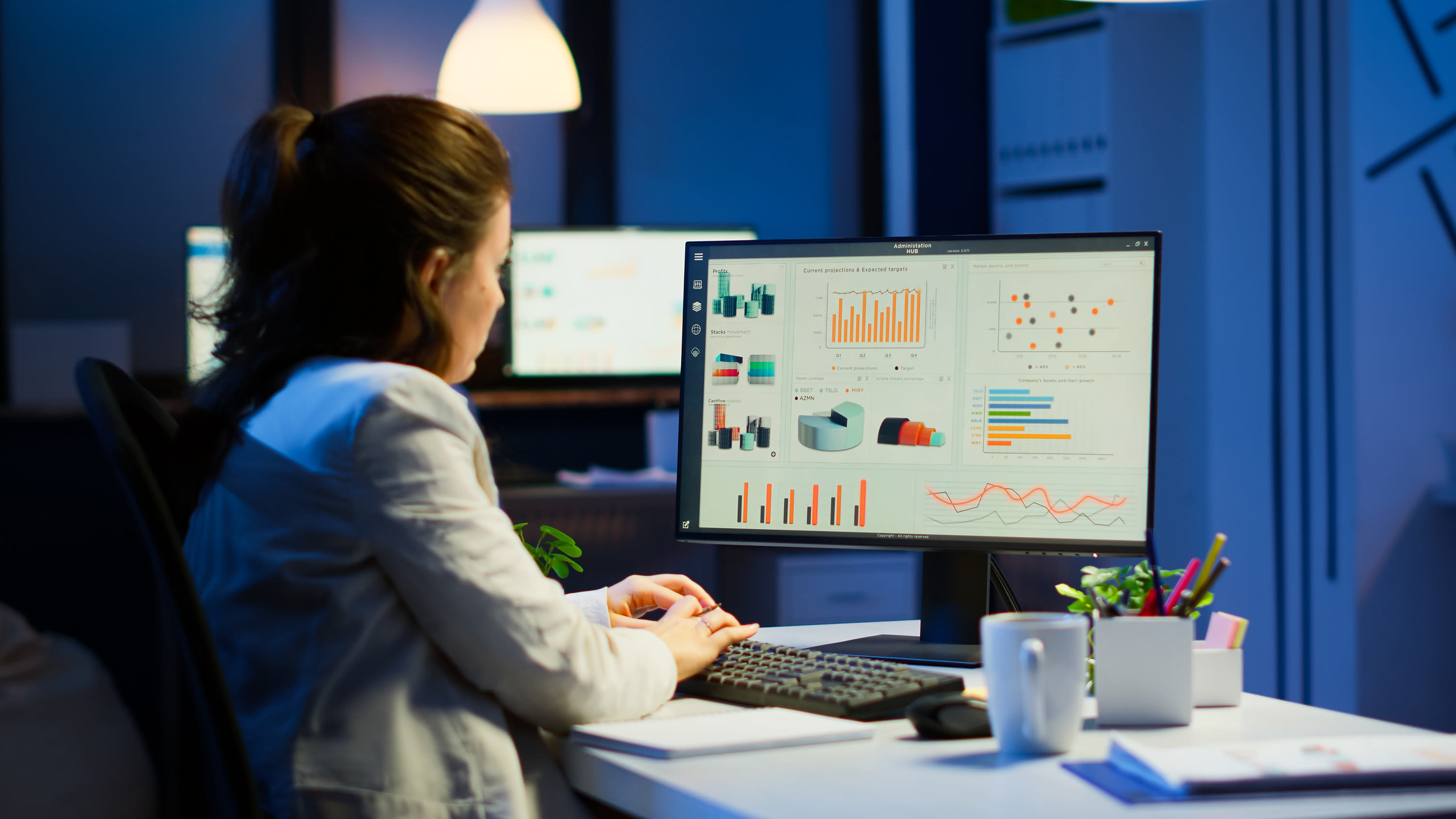 busy-woman-working-night-front-computer-taking-notes-writing-notebook-annual-reports-checking-financial-project-focused-employee-using-technology-network-wireless-doing-overtime-job2