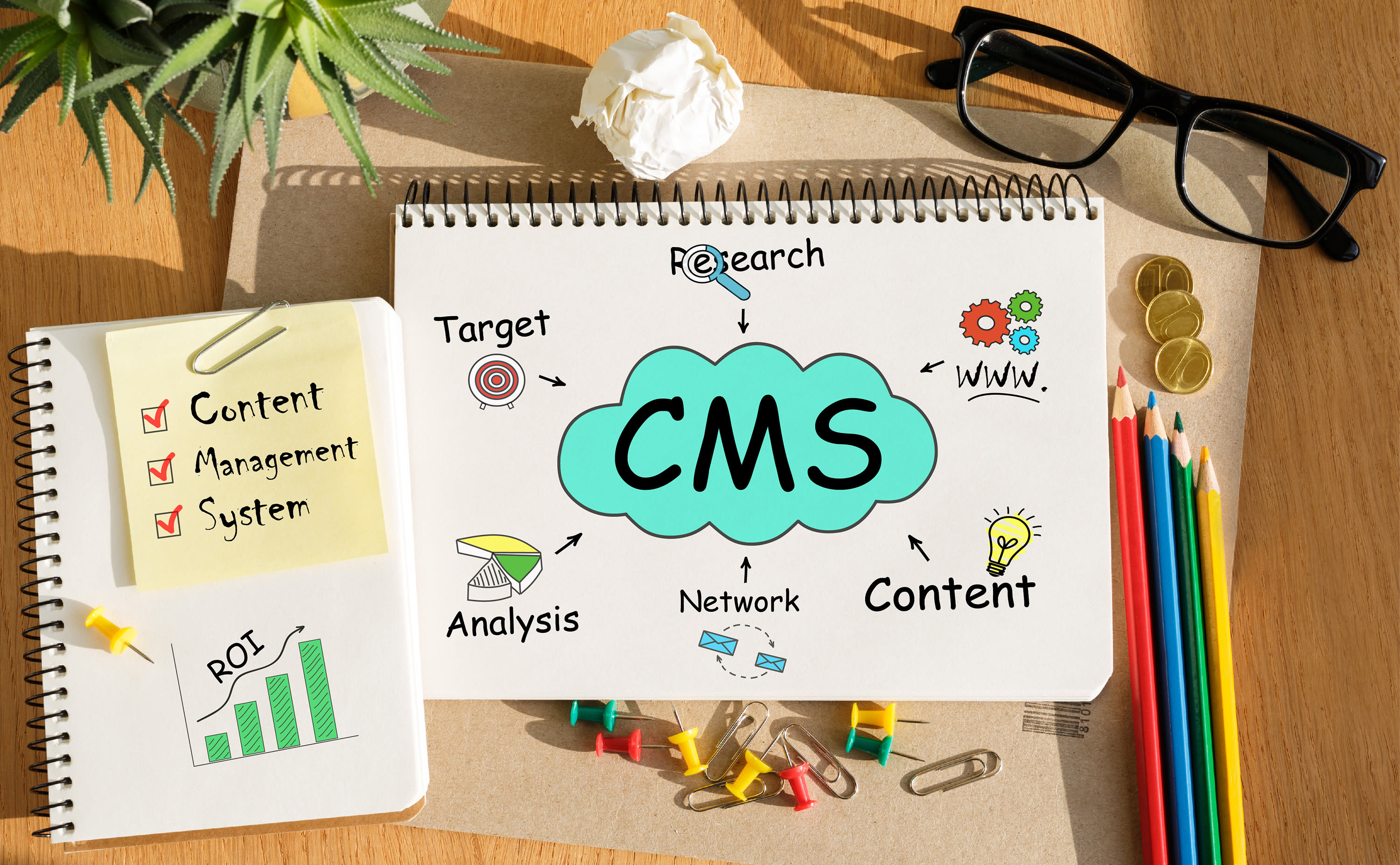 notebook-with-toolls-notes-about-cms-concept2