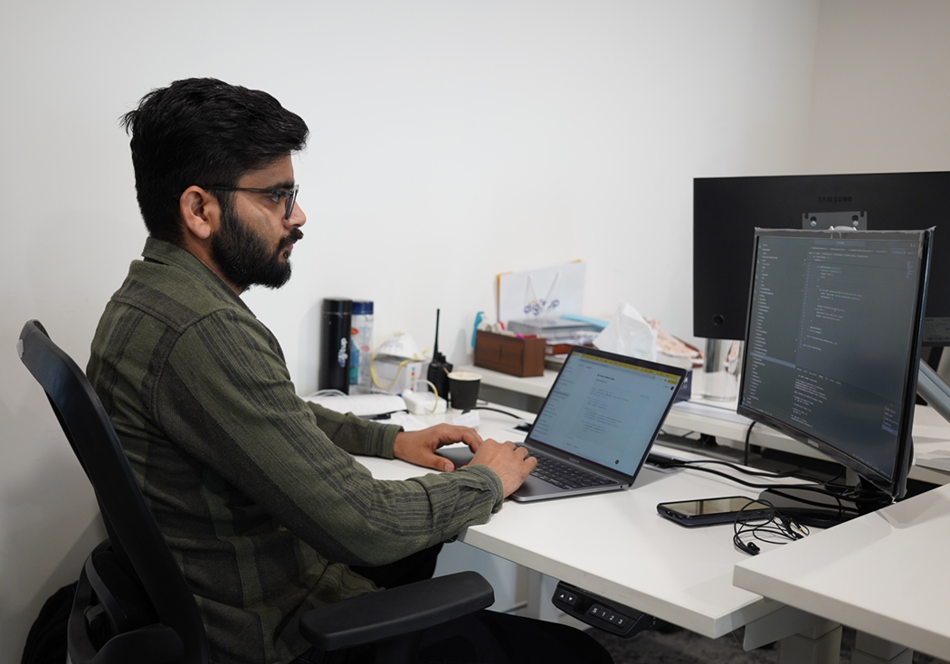 Digitup team member focused at his desk, representing a culture of independent decision-making, trust, and work-life balance.