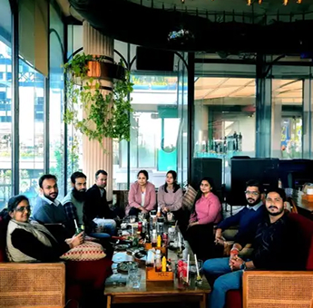 Team Digitup enjoying a relaxed team lunch at a café