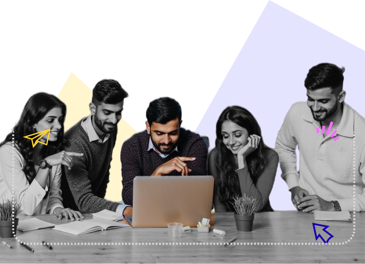 young professionals collaborating at a desk with laptops and notebooks, representing talent growth and teamwork