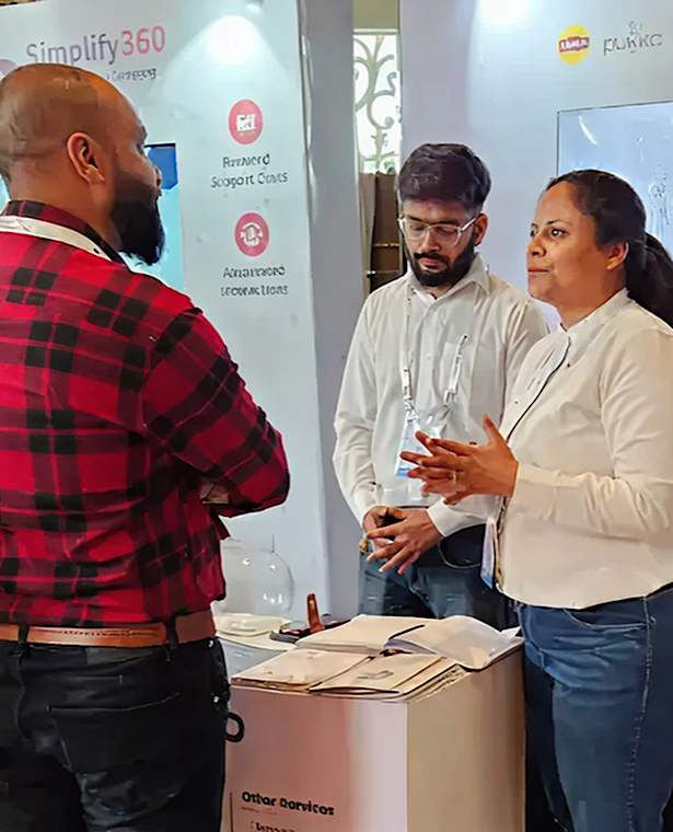 Digitup team members engaging in professional discussions at a technology and AI-focused industry event, showcasing leadership presence and networking activity. 