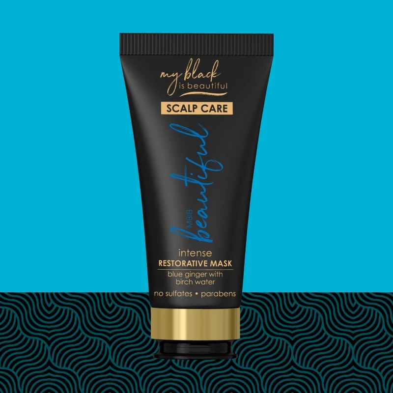 My Black is Beautiful Blue Ginger Intense Restorative Mask bottle with a pattern in the background