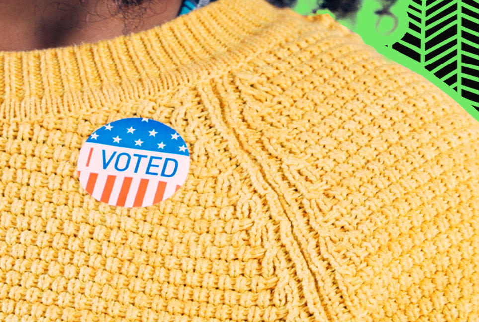 Woman with a sticker that says I voted