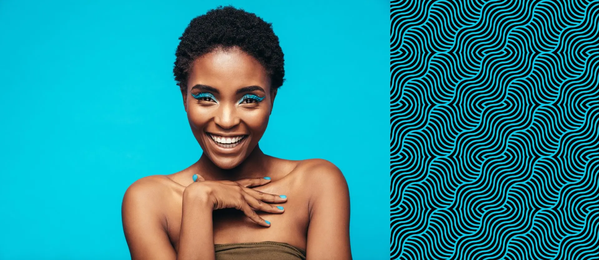 Woman smiling with bold makeup 