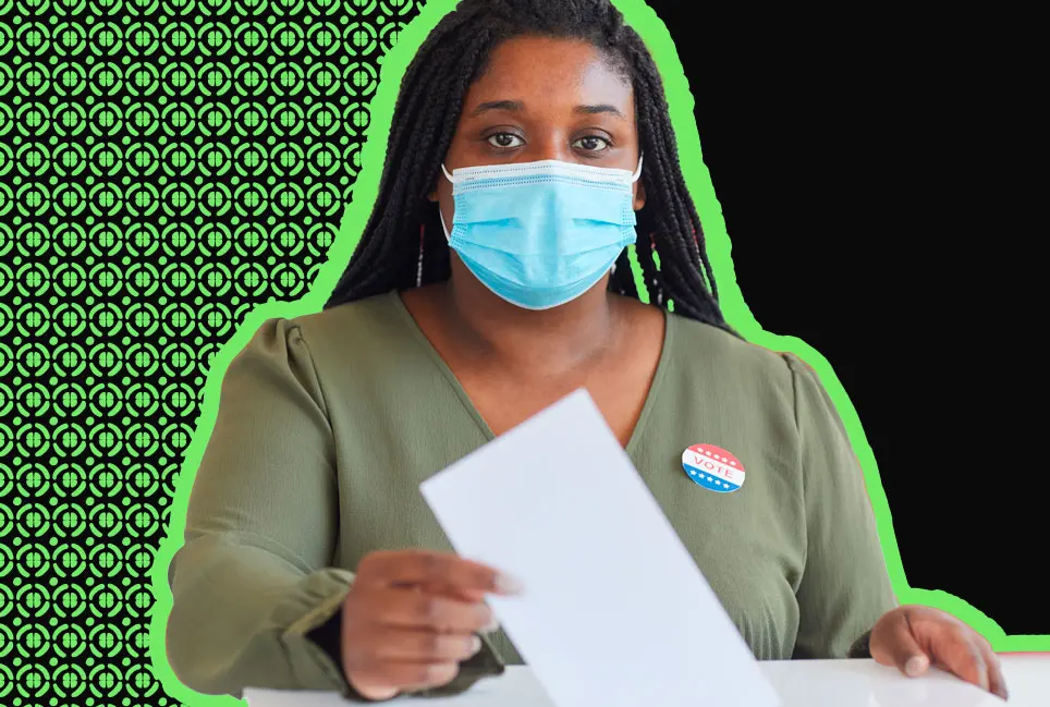 Black woman voting and wearing a mask