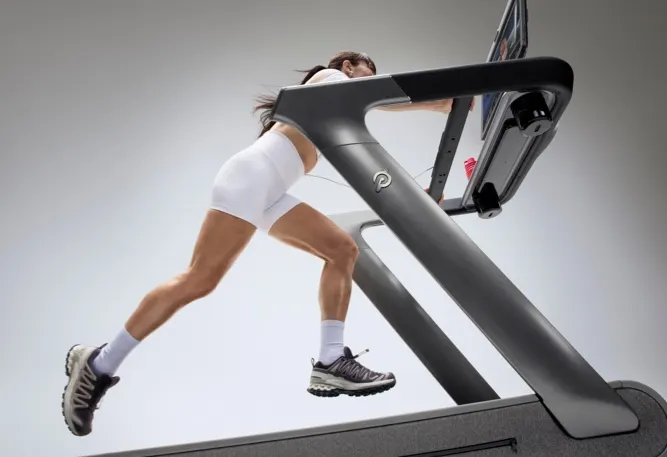 A woman running on Peloton Tread+ Pro.