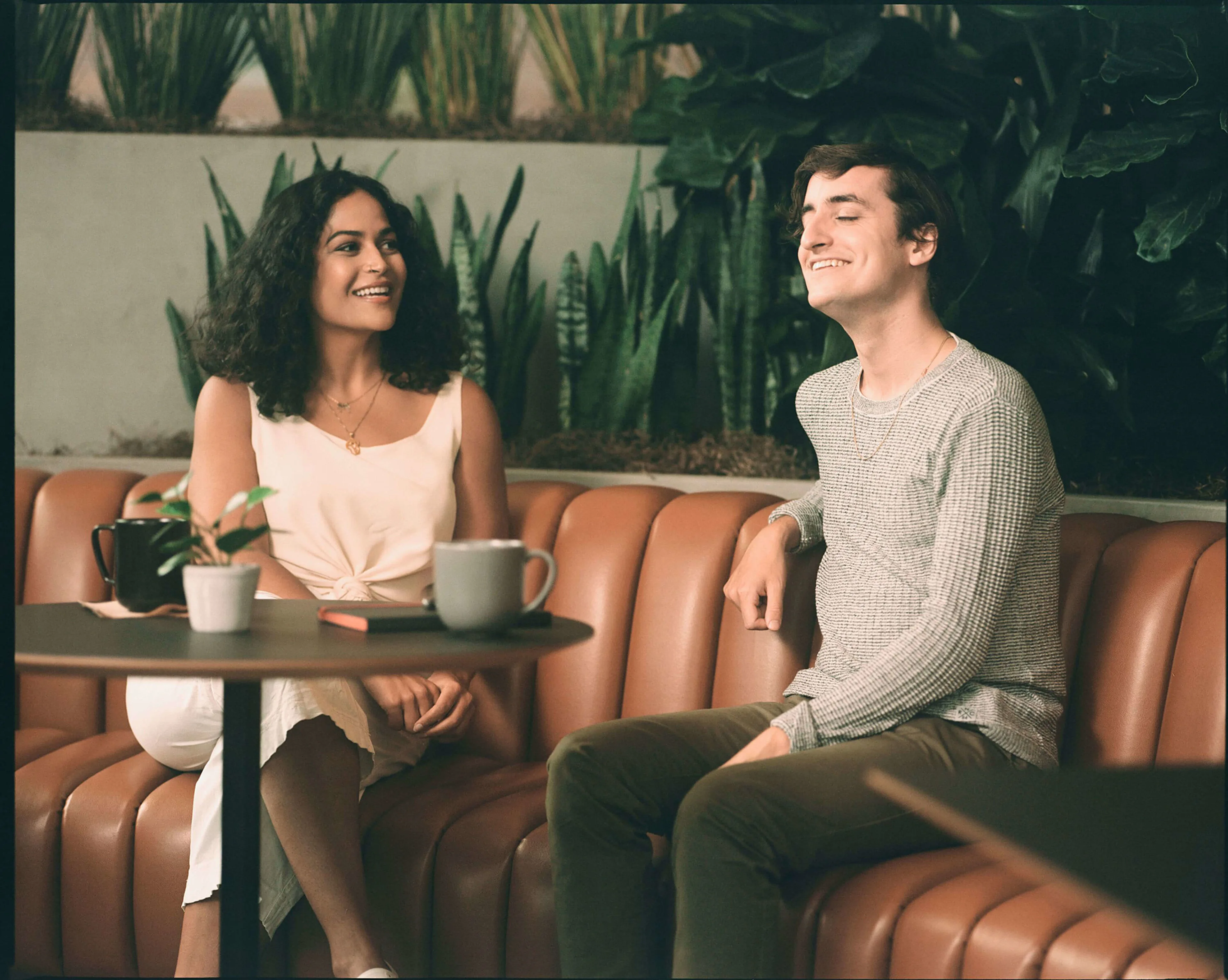 A man and a woman sitting at a table