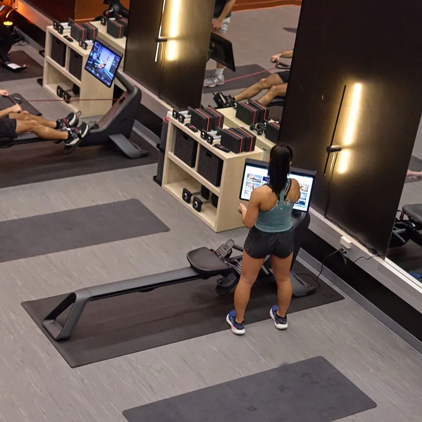 A Peloton branded gym featuring Peloton Bikes
