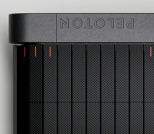 Close-up of the Peloton Tread+ slat belt with textured running surface.