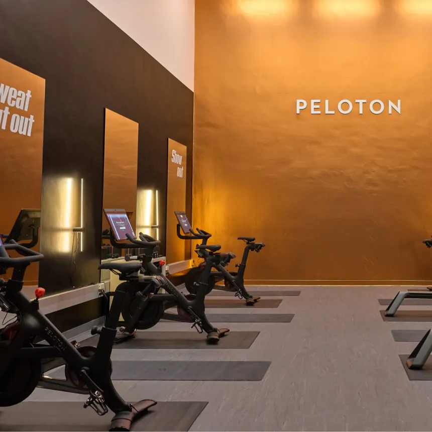 A Peloton branded gym featuring Peloton Bikes