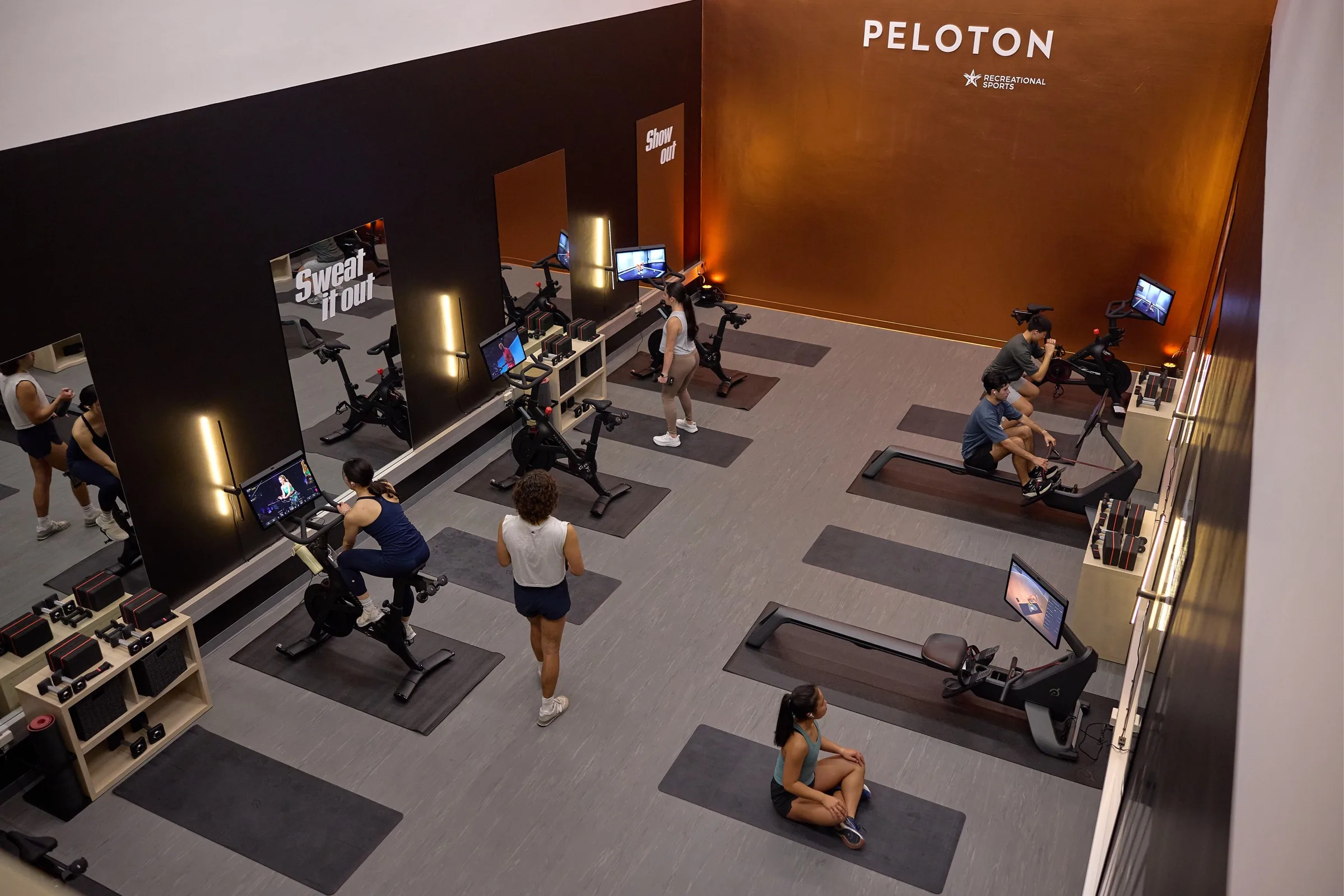 A branded Peloton area in gym at the University of Texas