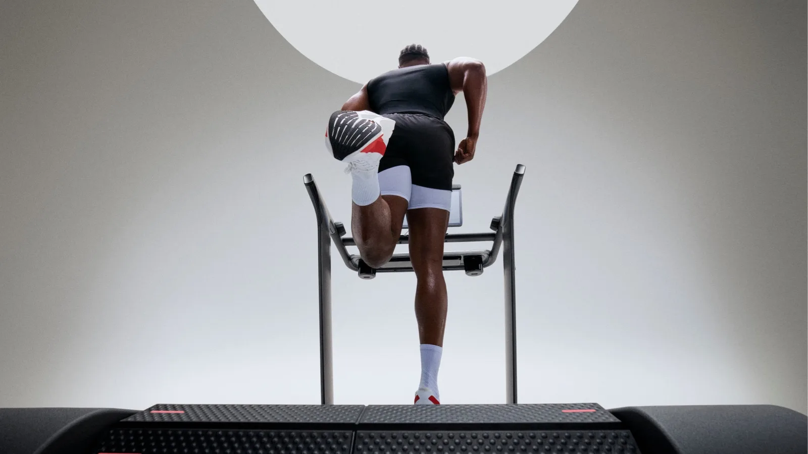 A person running on a Peloton Tread+ Pro 