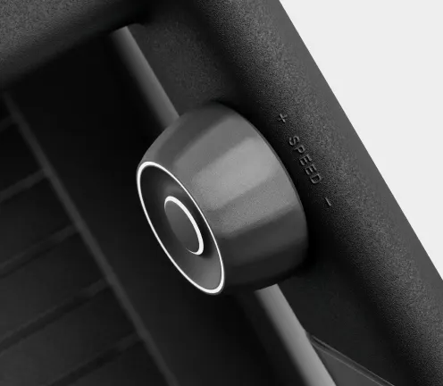 Rear view of a person walking on the Peloton Tread+ with the motor turned off for a self-powered workout.