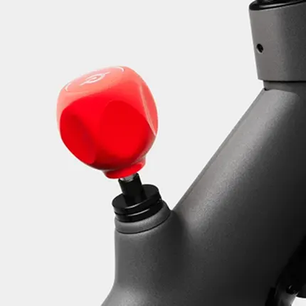 Red resistance knob on a Peloton Commercial Bike