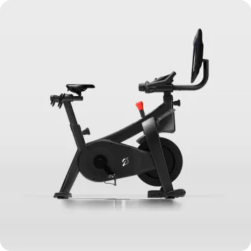 Peloton Commercial Bike, side angle, with the screen rotated toward the viewer