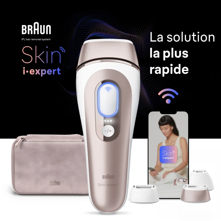 Épilateur à lumière pulsée au centre, derrière lui une pochette beige, un appareil mobile avec l'application Skin i·expert et trois accessoires