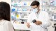 Pharmacist scanning barcode on medications