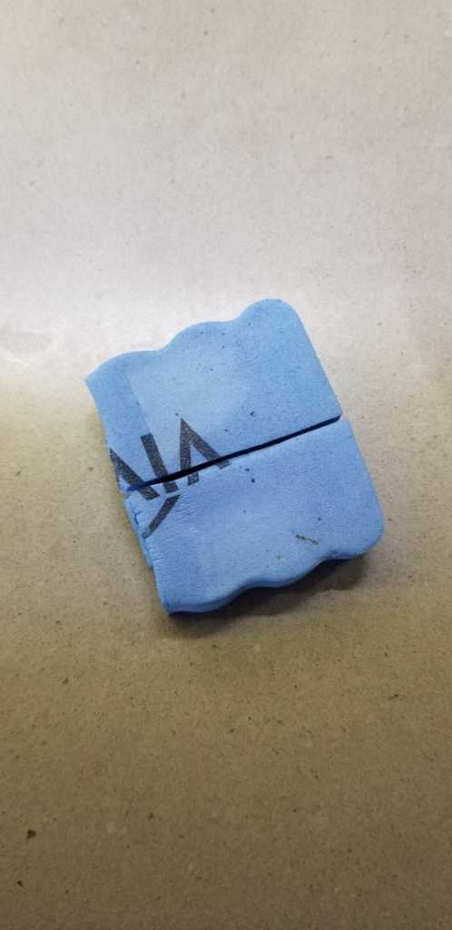 A picture of an eraser with lines drawn on it
