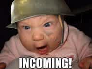 Baby with helmet with the word "Incoming!"