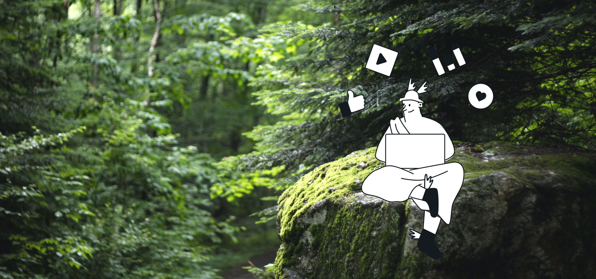 Hermes working with his laptop in the middle of the forest