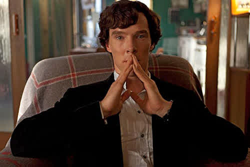 Benedict Cumberbatch as Sherlock in solemn pose