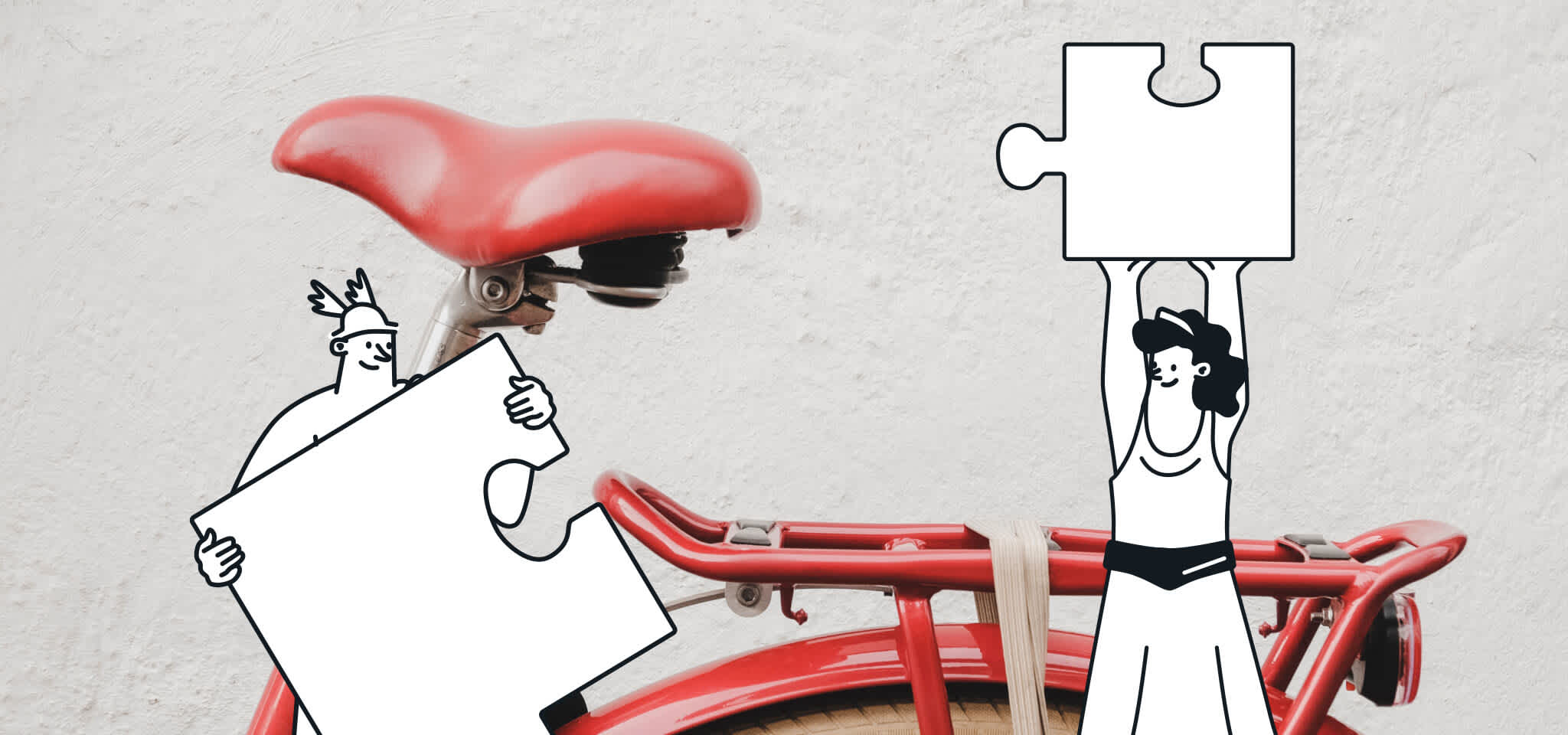 Deux dieux avec une pièce de puzzle devant le siège du vélo
