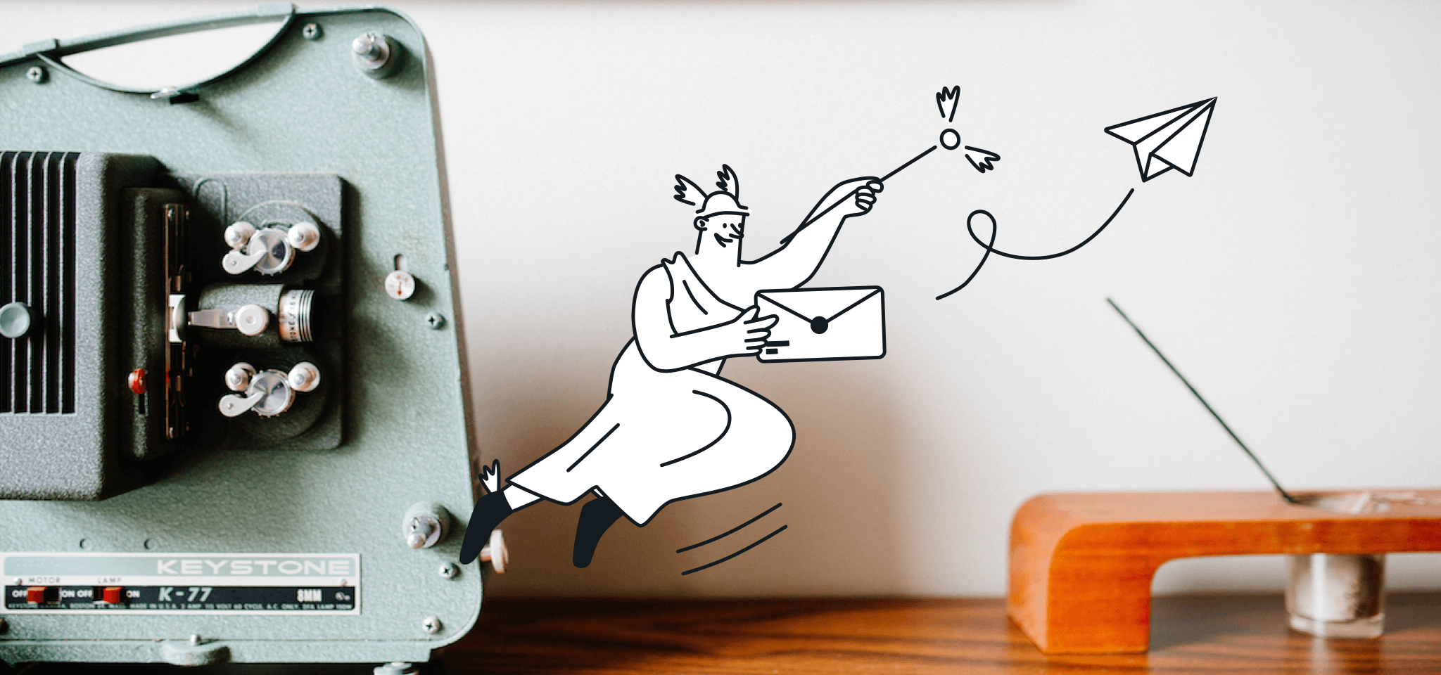 Hermes flies with an email in front of an old movie projector