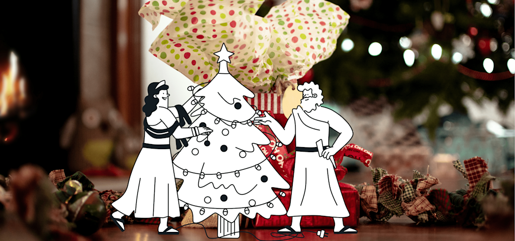 Un Dieu et une Déesse décorent un arbre de Noël