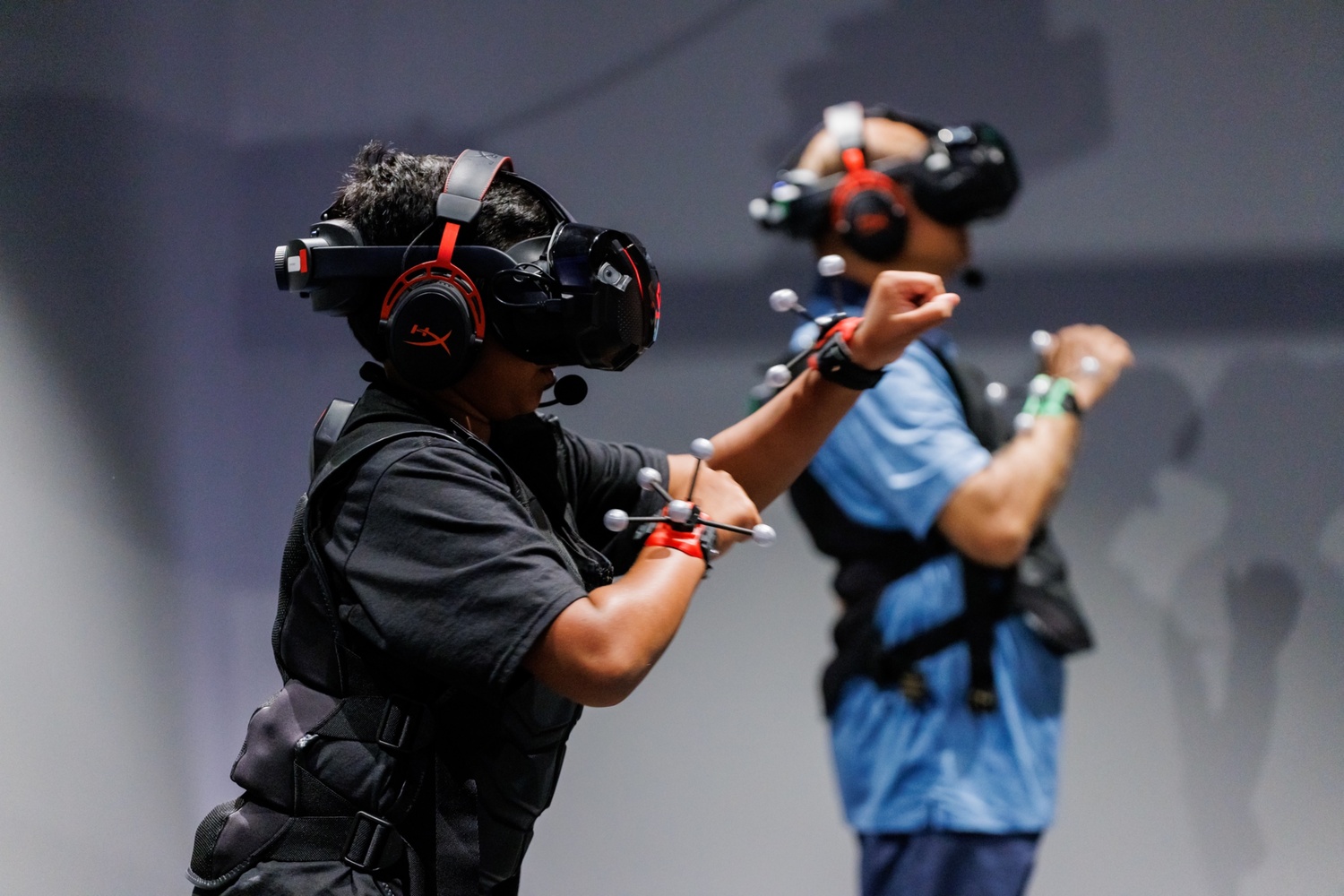 Father and son playing in VR