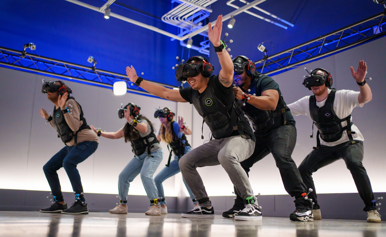 Group of friends playing Sandbox VR Squid Game immersive experience 