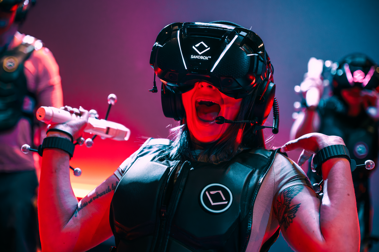 Woman reacting in VR headset