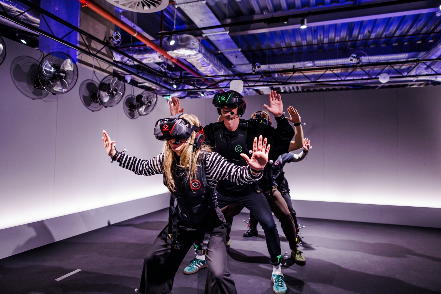 Group of friends playing virtual reality