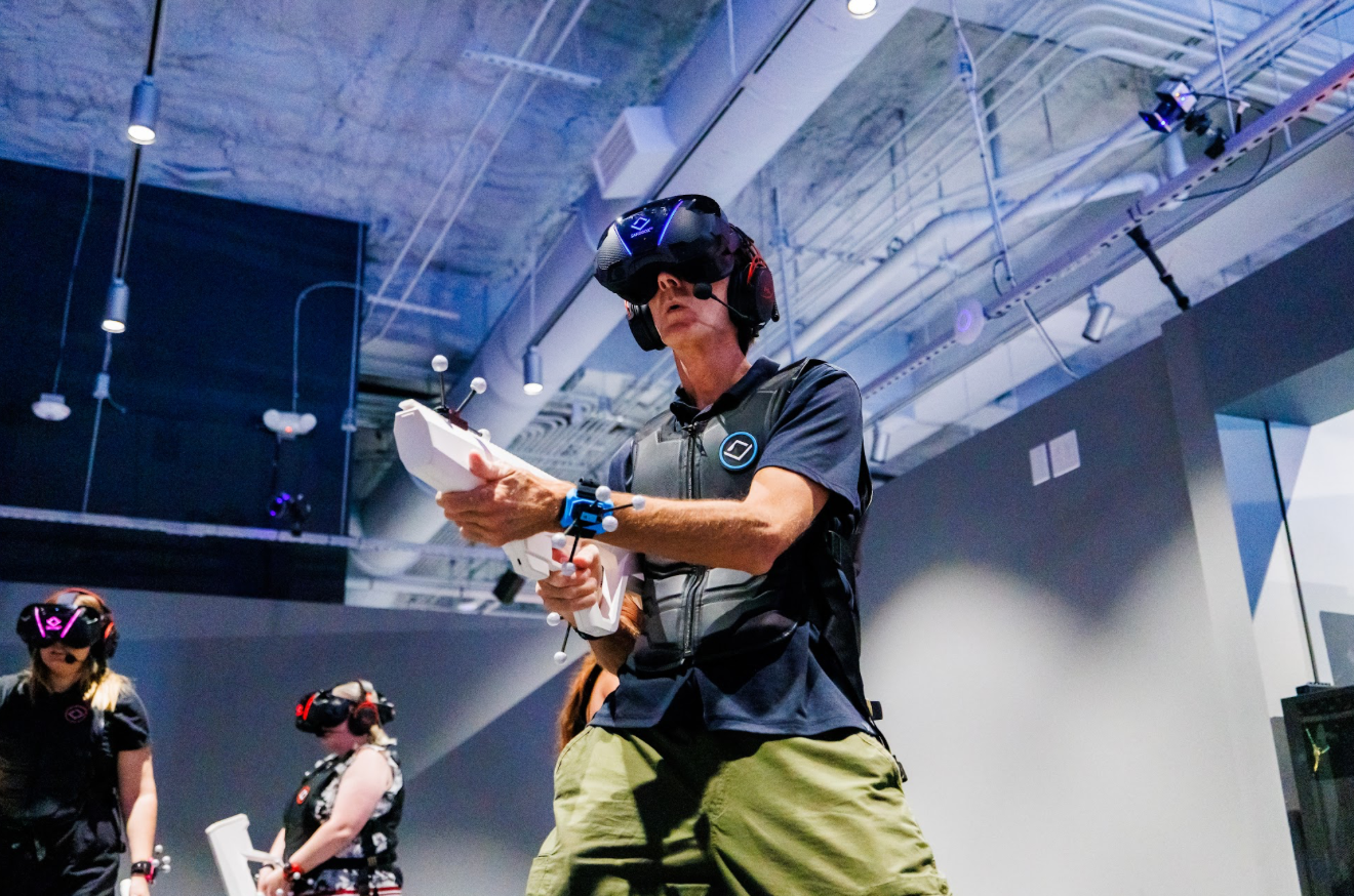 Man playing a VR experience in immersive VR gear