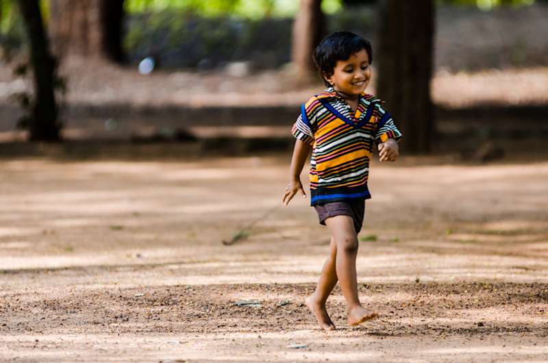 Not a care in the world, how children are meant to be, bare-foot, happy and just being in the moment.