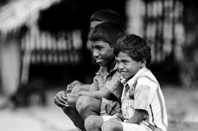 Kids from a village in my hometown, camera shy, still wants to be clicked while pretending to not notice the lens, I like the unfiltered emotions in their face.