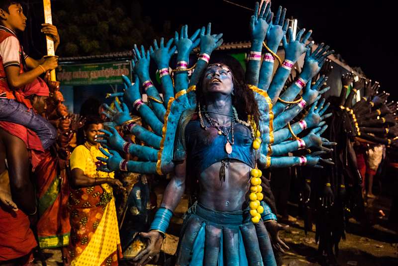 Shot during Kulasai Dassara festival celebrations in Kulasekarapattinam in Tamil Nadu. A man, dressed up as Durga, performs a fiery, passionate dance.