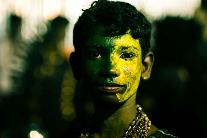 Shot during Kulasai Dassara festival celebrations in Kulasekarapattinam in Tamil Nadu. People dress up as gods and devils, this kid has both, one on each side, aren't we all the same?