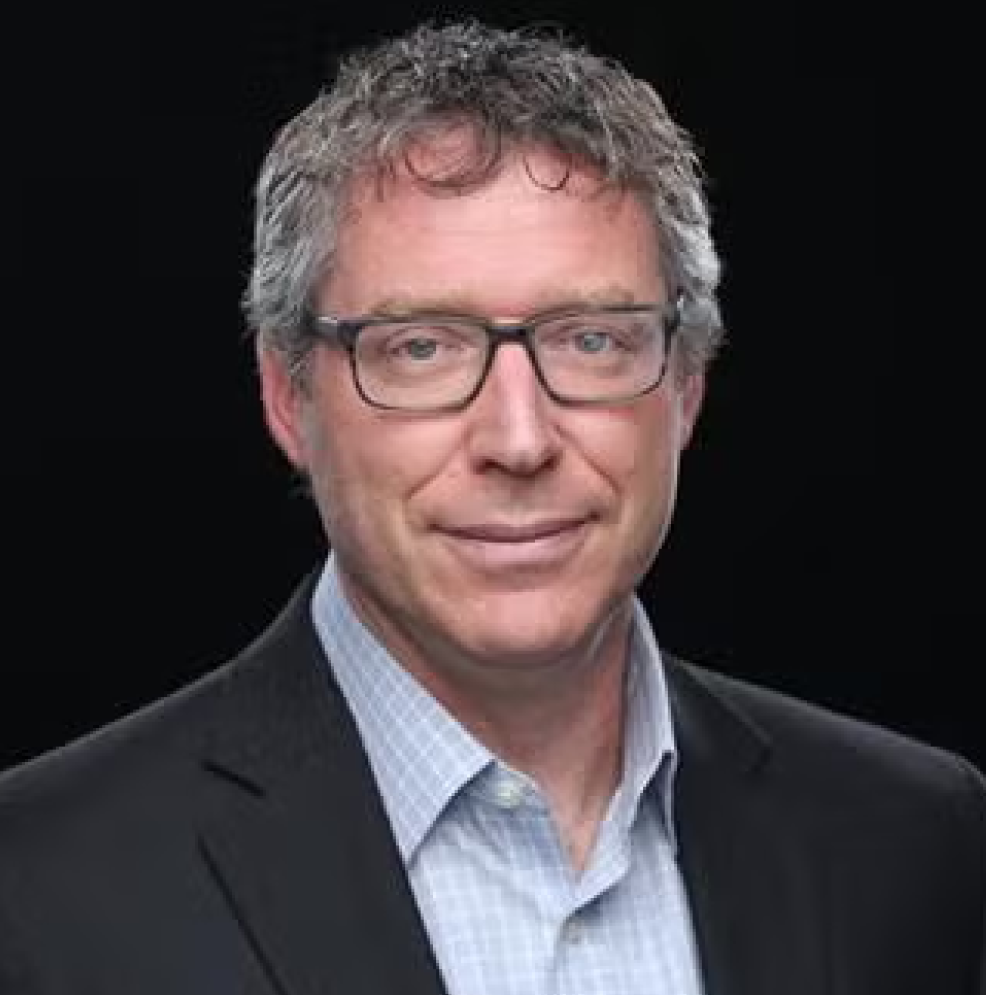 headshot of Adam Kaminsky