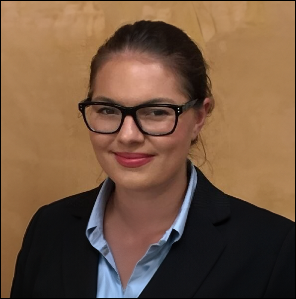 headshot of Claire Huskins