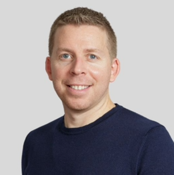 headshot of Eric Friedman