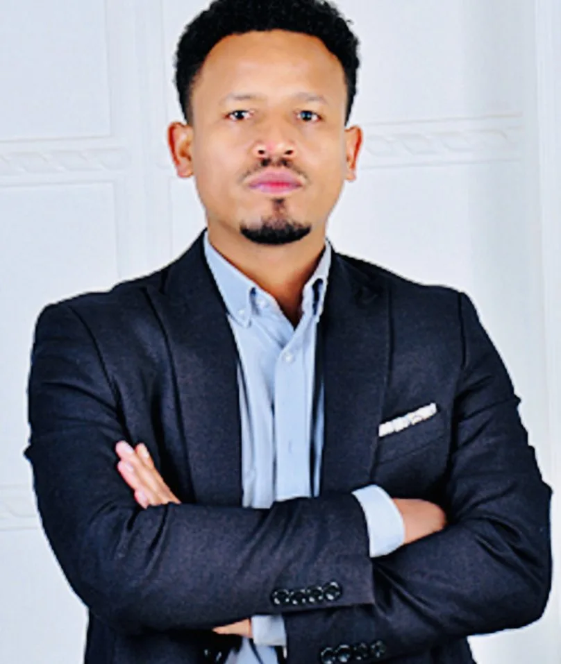 Headshot of Almaw Molla, founder of Coffee Resurrect.