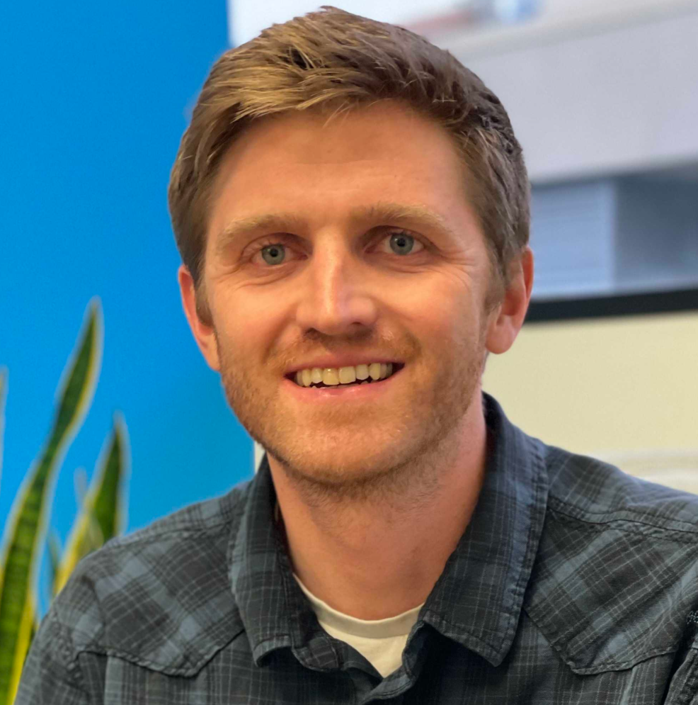 headshot of Mica Cole